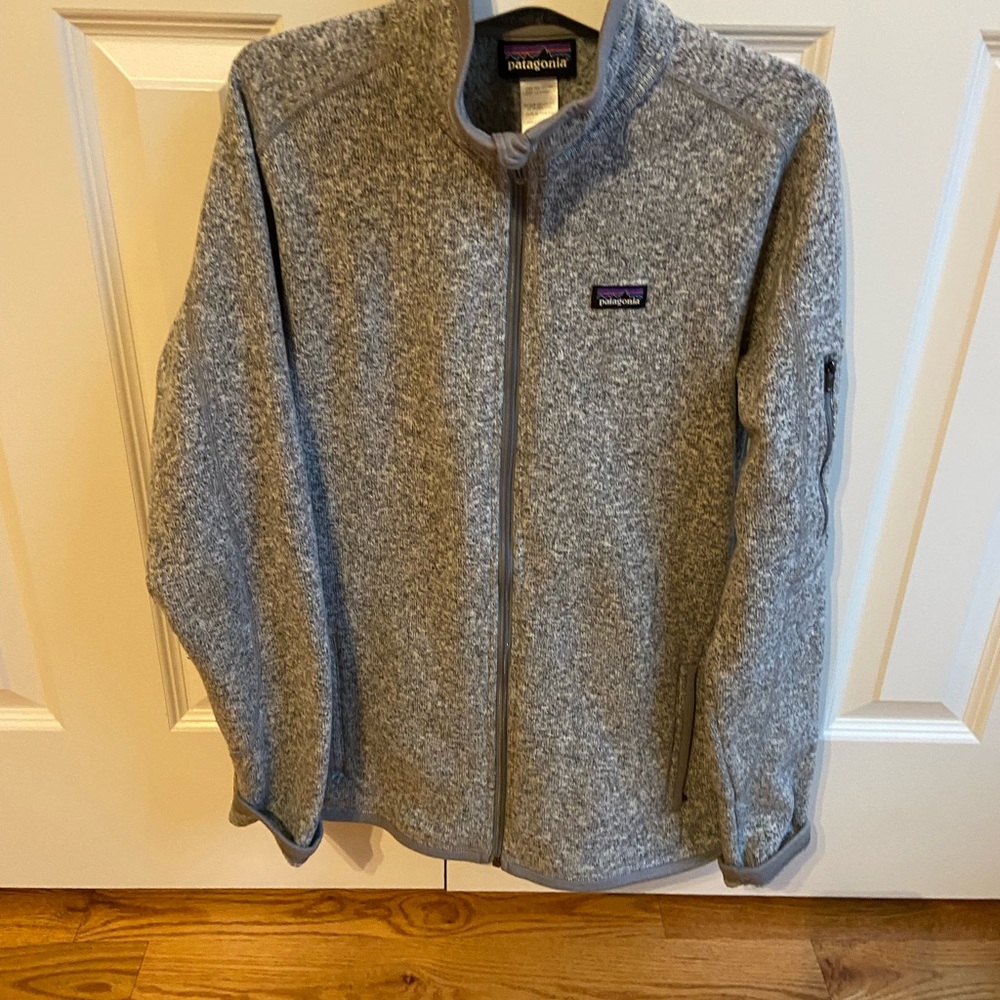 Woman’s large gray patagonia sweater jacket.